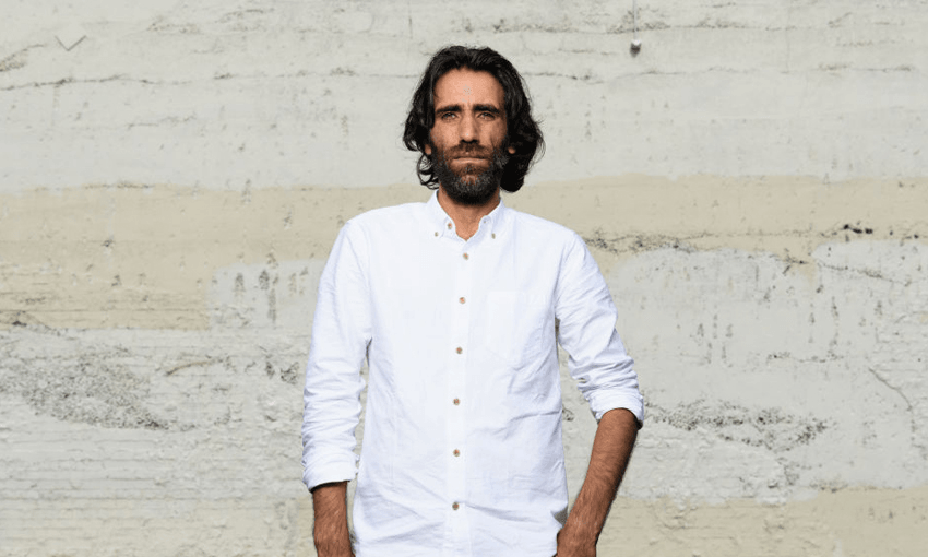 Former Manus Island refugee Behrouz Boochani poses during a photo shoot on November 19, 2019 in Christchurch, New Zealand (Photo by Kai Schwoerer/Getty Images) 
