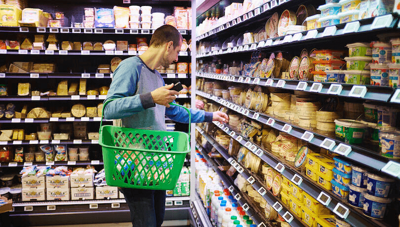 Man shopping in supermarket