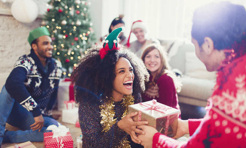 This stock image woman? She looks happy about the gift but really she wants to know who did the tree. 
