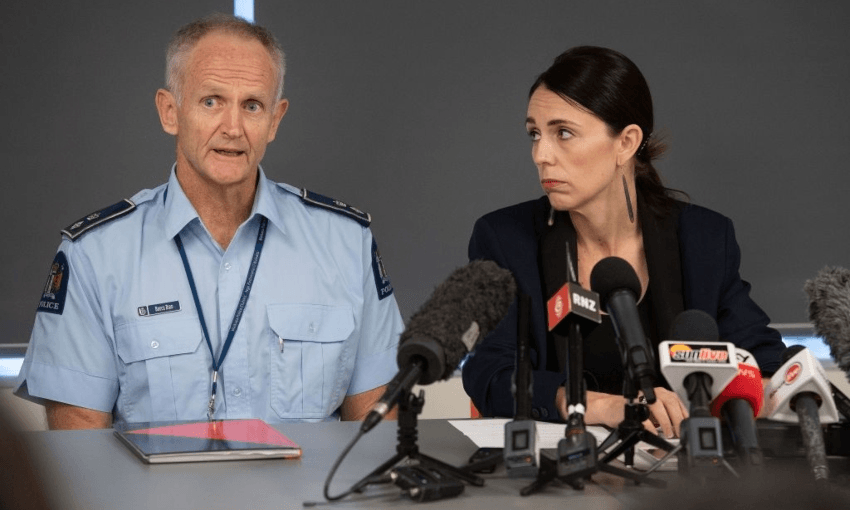NZ Police Superintendent Bruce Bird and PM Jacinda Ardern speaking to media about the eruption of Whakaari (Getty Images) 
