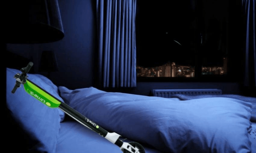 a lime scooter lies in a bed at night