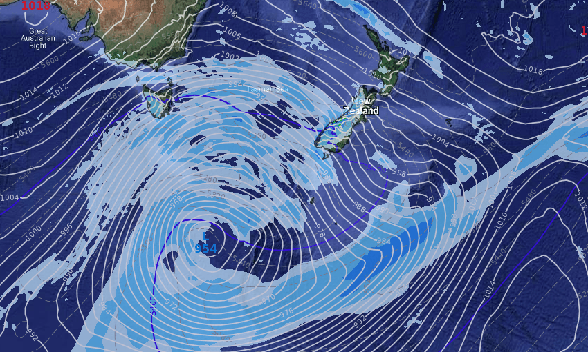 a storm in the southern ocean expands outward over the bottom of both new zealand and australia