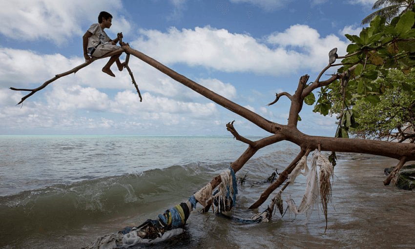 The tide comes in in Kiribati. (Photo by Jonas Gratzer/LightRocket via Getty Images) 
