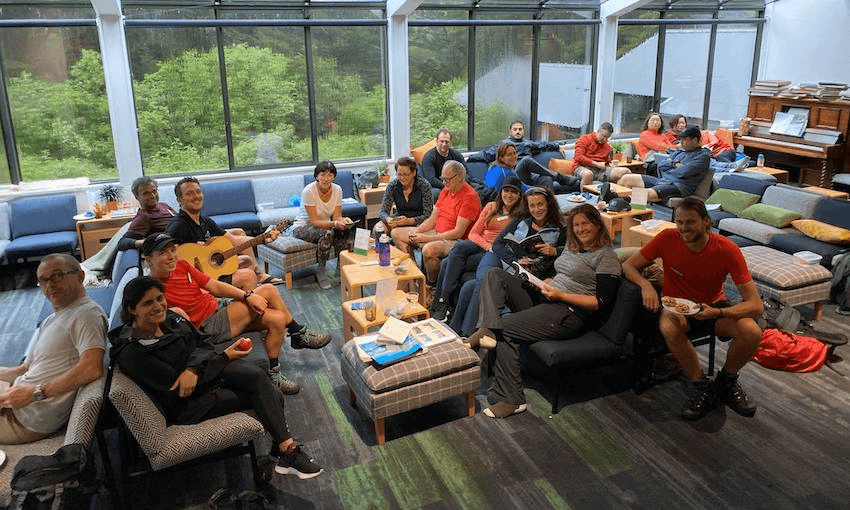 No cabin fever detected: the trapped trampers on Milford Track. Photo: Oliver Missen 

