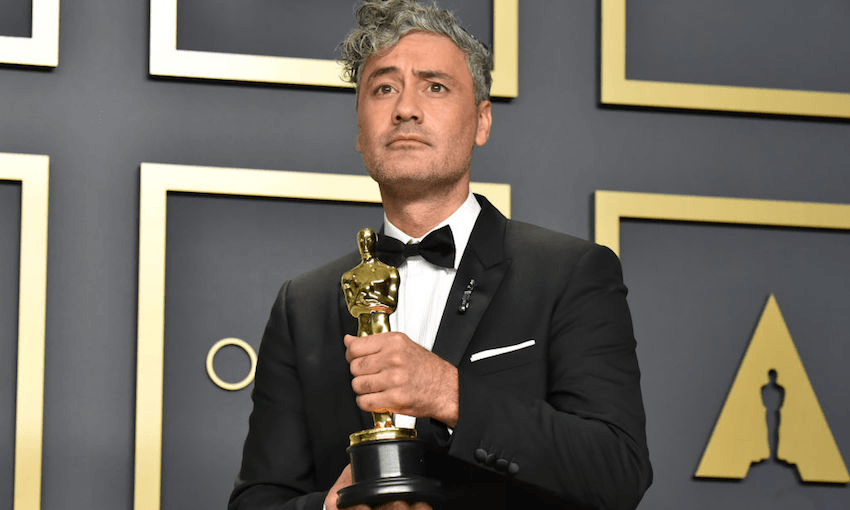 Taika Waititi, and his award for best Adapted Screenplay award for “Jojo Rabbit,” at the 92nd Annual Academy Awards. (Getty Images).  
