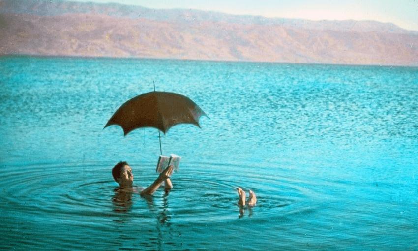 A man floats in the Dead Sea, 1930. Universal History Archive/Universal Images Group, via Getty.  
