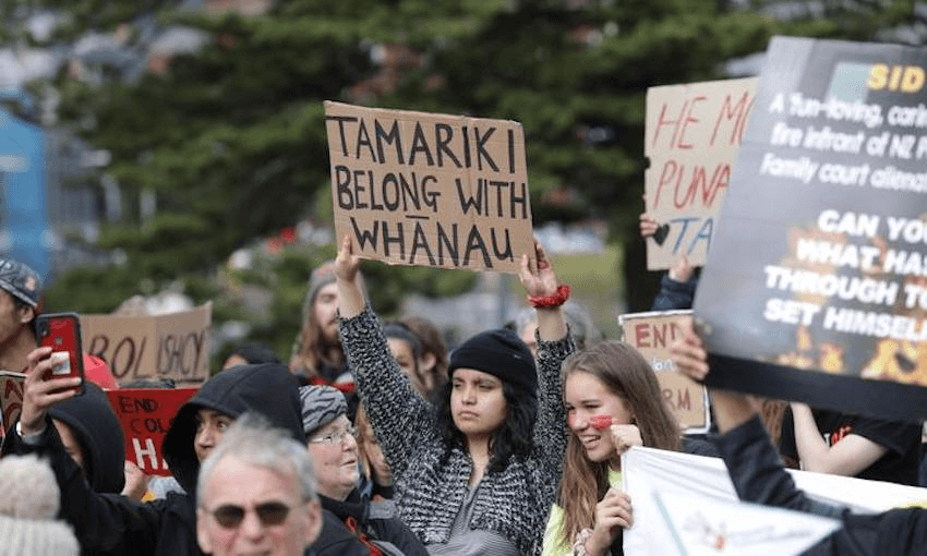 Wellington protesters at a rally in July last year against Oranga Tamariki’s removal of Māori children from whānau (Photo: RNZ/Ana Tovey) 
