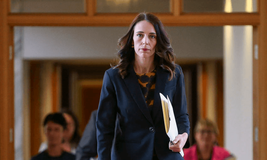 Jacinda Ardern walks to the house to declare a State of National Emergency (Photo by Hagen Hopkins/Getty Images) 
