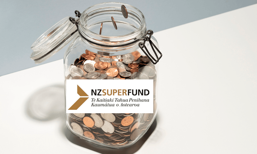 Man’s hand tossing US coins into glass jar of change on white shelf, grey background 
