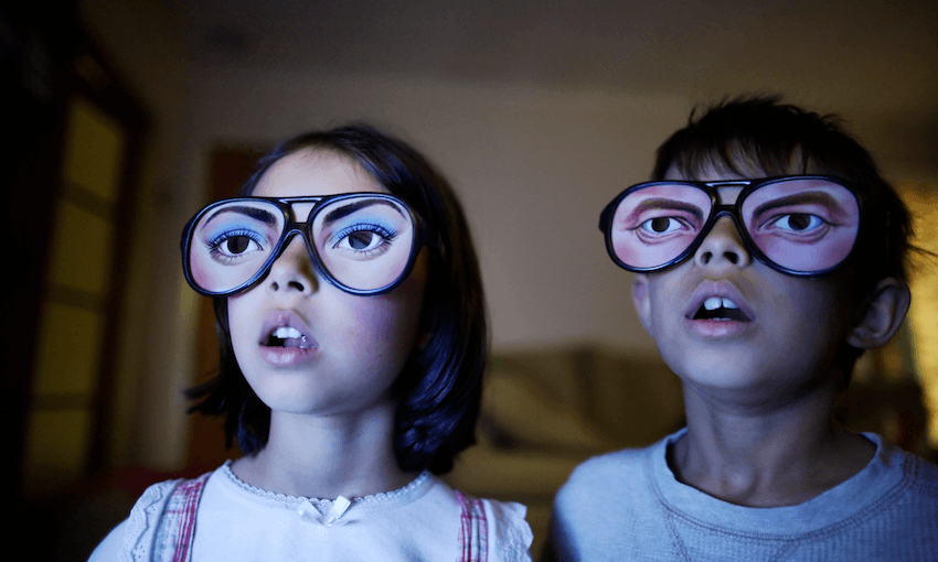 What are these stock image kids watching? The answer may surprise you! Photo: Getty. 

