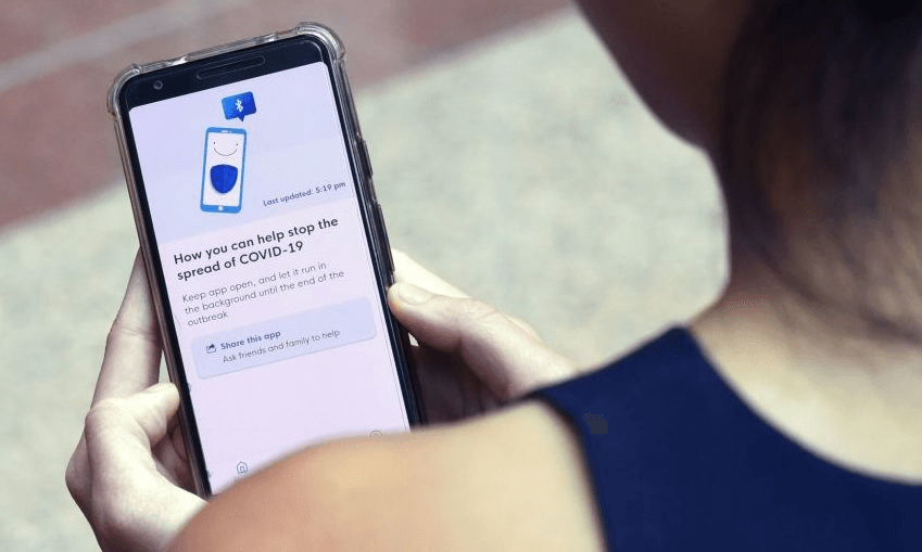 Singapore’s contact-tracing smarthphone app TraceTogether (Photo by CATHERINE LAI/AFP via Getty Images)