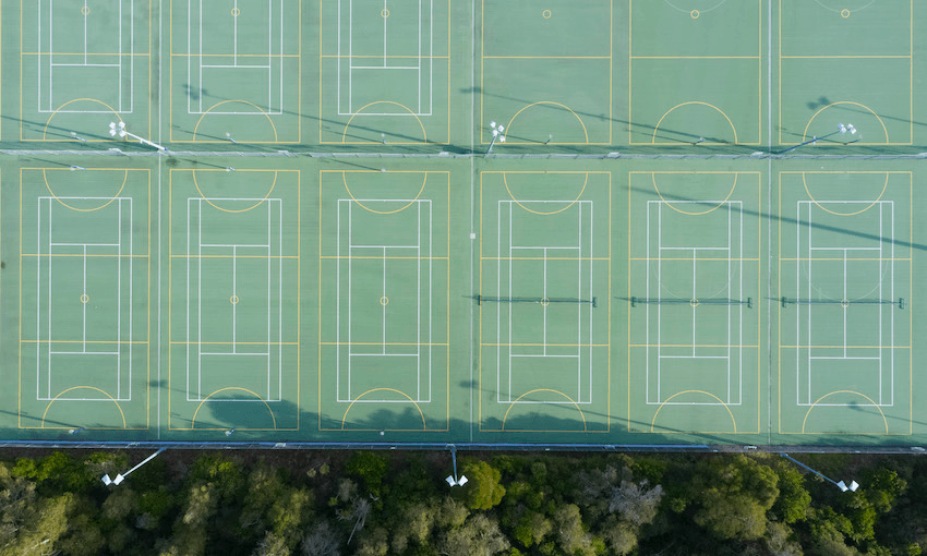 An aerial shot over empty netball and tennis courts in Auckland during lockdown (Photo: WOWstockfootage/Getty Images) 
