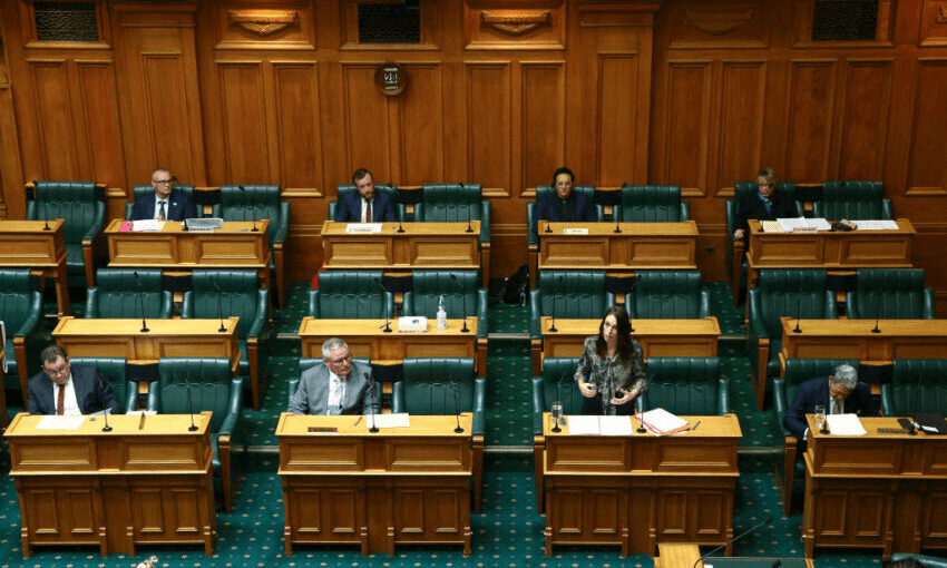 The physically distanced government benches in parliament. (Photo by Hagen Hopkins/Getty Images) 
