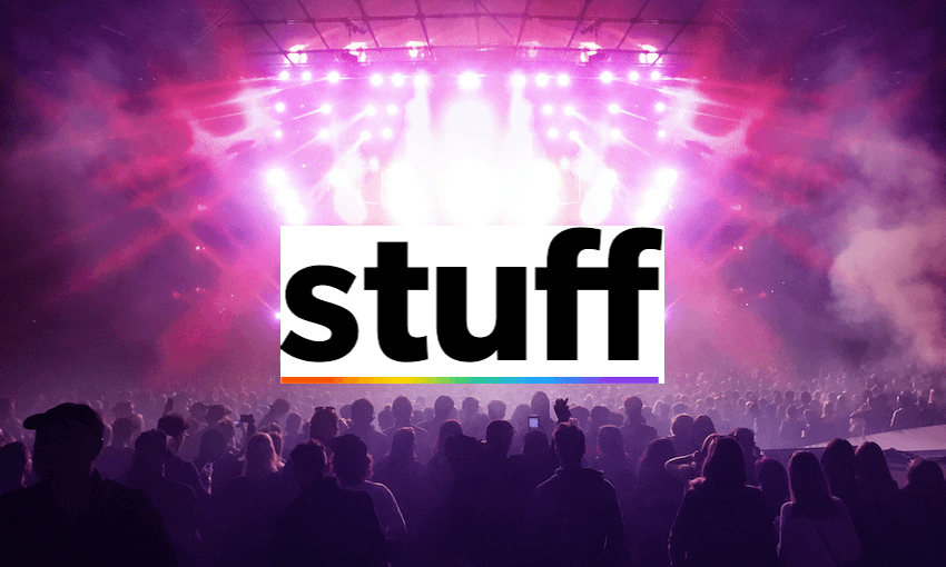 silhouettes of concert crowd in front of bright stage lights