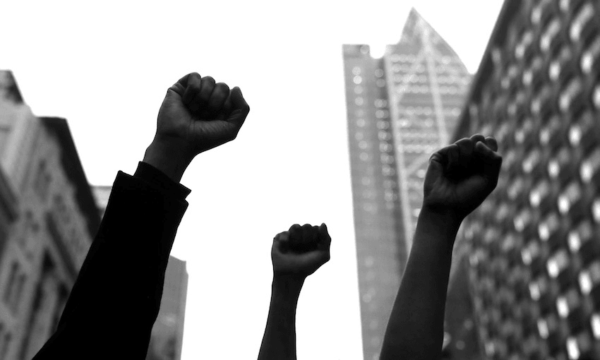 Protesters march down Queen Street on June 01, 2020 in Auckland, New Zealand. (Photo: Hannah Peters/Getty Images) 
