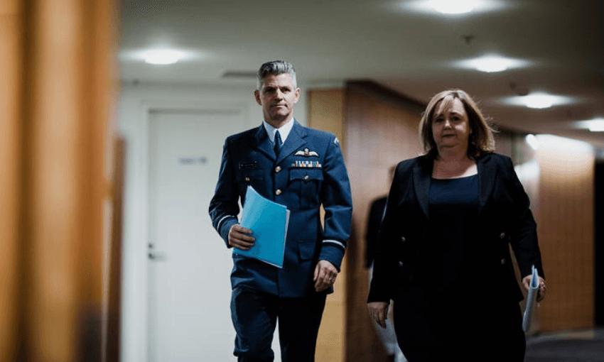 Minister Megan Woods and Air Commodore Digby Webb heading to a press conference (Photo: Radio NZ, Dom Thomas)  

