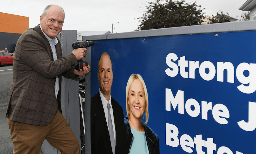 Todd Muller erects election signage on June 26 in Napier (Photo: Kerry Marshall/Getty Images) 
