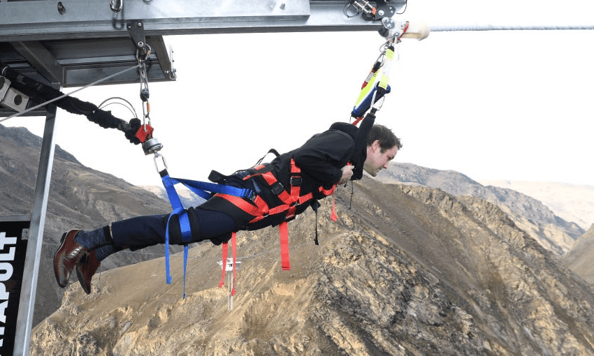 Hamish Walker testing out a human catapult in Queenstown, which works as a tasty metaphor for this story (Getty Images) 
