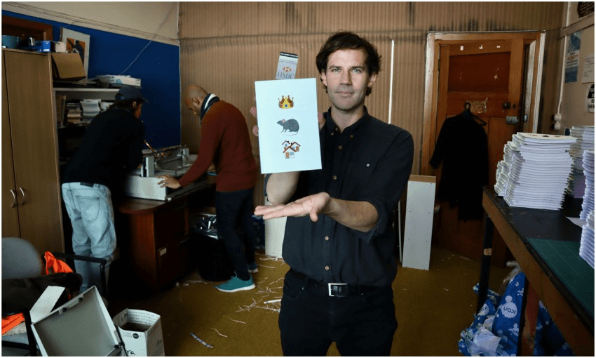 Murdoch Stephens with his novel Rat King Landlord (Photo: Hannah Beattie) 
