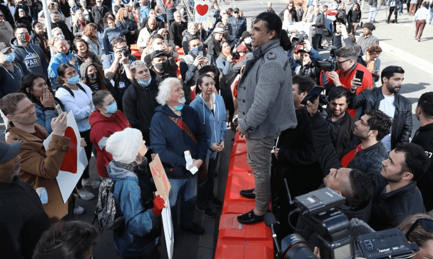Survivor Abdul Aziz addresses the crowd after the Christchurch mosque shooter was sentenced (Getty Images)