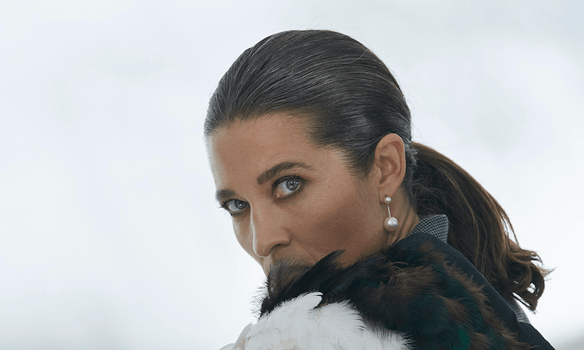 Kiri Nathan contemporary full feather kākahu, $5000. Jasmin Sparrow earrings, $389. 
