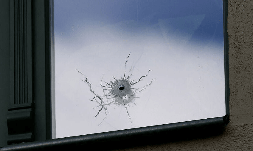 A bullet hole near the synagogue in Halle, eastern Germany, where an anti-semitic attack took place in October 2019. (Photo by Ronny Hartmann / AFP)  
