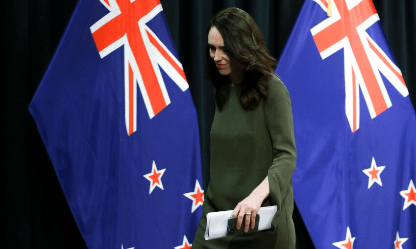 Jacinda Ardern leaves the Beehive Theatrette after answering the question on everyone’s lips: When will the NZ election be held?  (Photo by Hagen Hopkins/Getty Images) 
