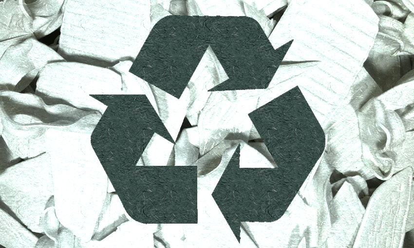 the recycling sign that is green-tinted