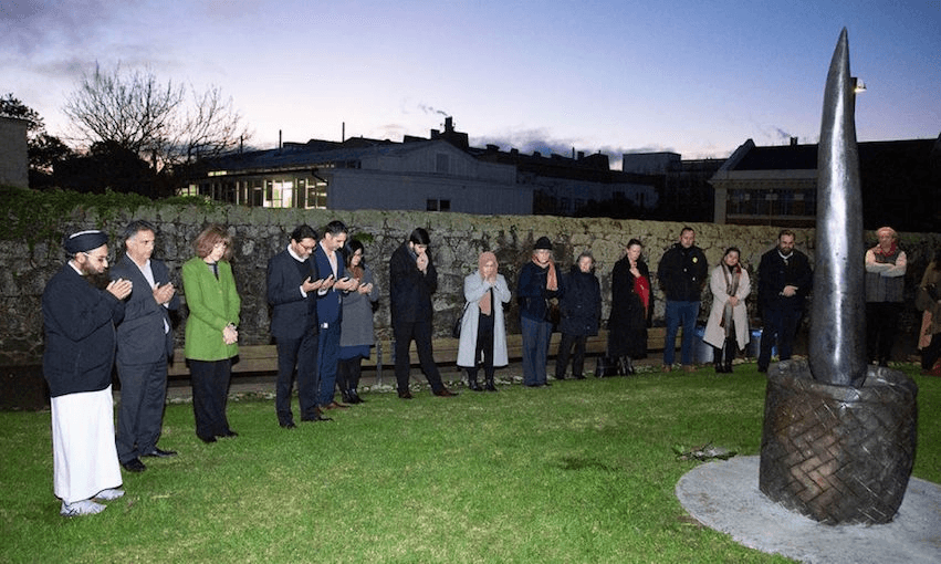 Guests at the dawn blessing for he unveiling of the memorial sculpture on 20 July. (Photo: Dean Carruthers/University of Auckland) 
