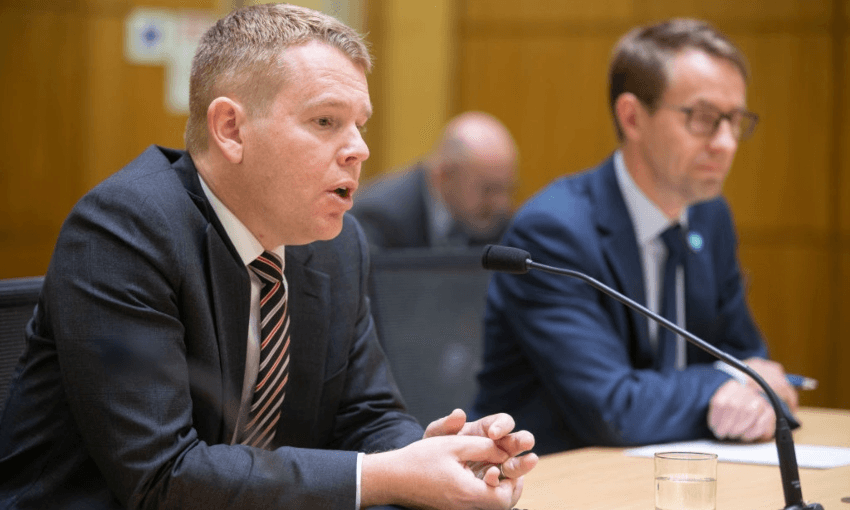 Health minister Chris Hipkins and Dr Ashley Bloomfield at the health select committee (Robert Kitchin – Pool/Getty Images) 
