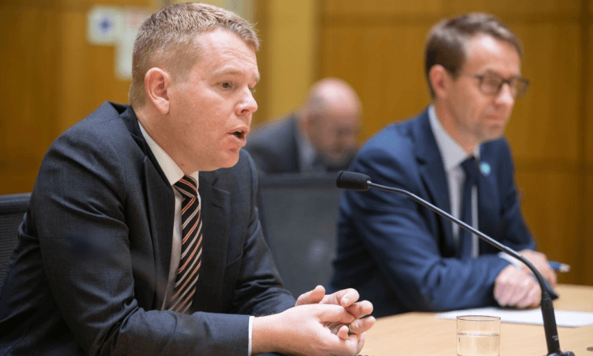 Health minister Chris Hipkins and Dr Ashley Bloomfield at the health select committee (Robert Kitchin – Pool/Getty Images)