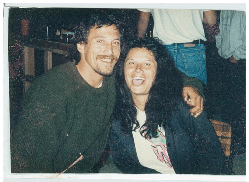 Stan Walker's mother and father in the early 1990s, sitting side by side, happy, embracing.