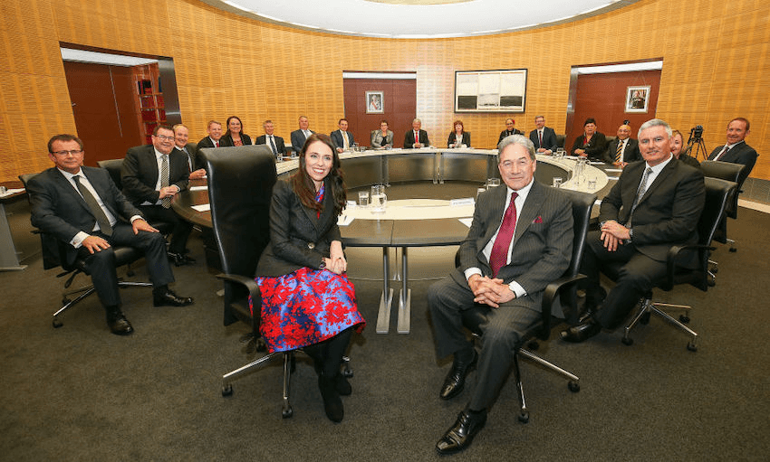 Prime Minister Jacinda Ardern and deputy Winston Peters pose during a cabinet meeting at Parliament on October 26, 2017 in Wellington. (Photo by Hagen Hopkins/Getty Images) 
