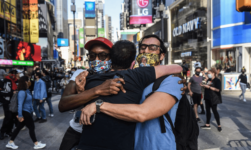 People celebrate in the streets after it was announced that Joe Biden would be the next U.S. President, in Times Square on November 7, 2020 in New York City. (Photo: Stephanie Keith/Getty Images) 
