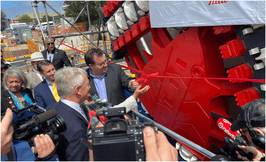 The ribbon is pulled on CRL’s new tunnel boring machine, named after Dame Whina Cooper. Photo: Justin Latif) 
