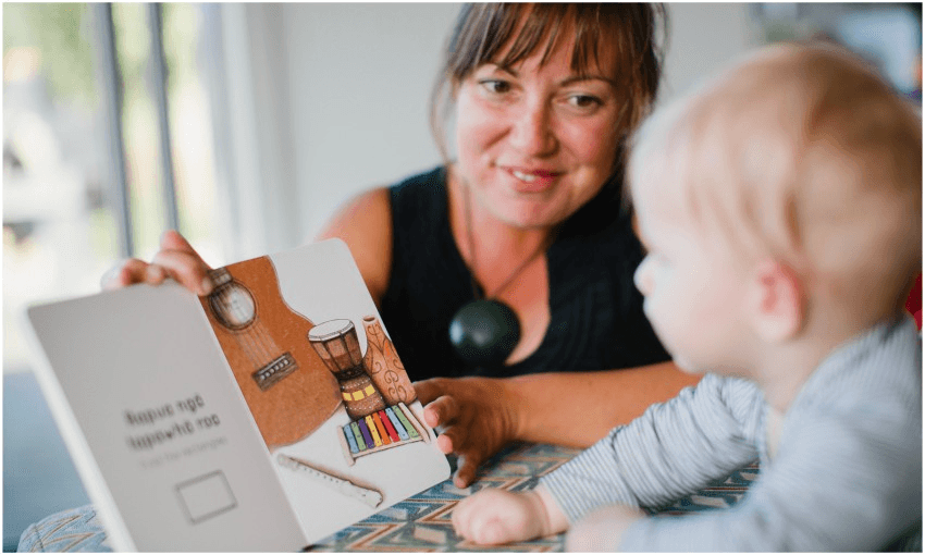 Kitty Brown, co-creator of the Reo Pēpi books, with pēpi York (Photo: Supplied) 
