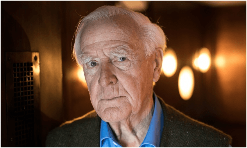Portrait of John le Carre looking directly at camera