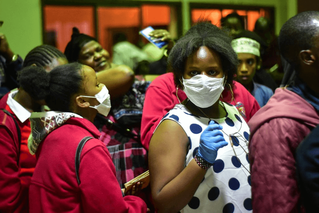 Temperature checks at the Tanzania-Kenya border. Photo by FILBERT RWEYEMAMU/AFP via Getty Images 
