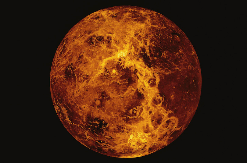 A fiery planet on black background