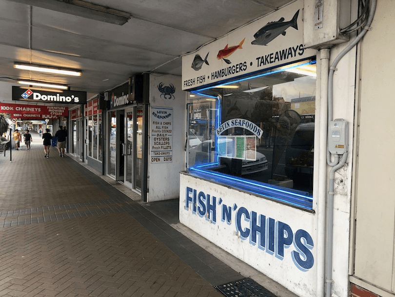 Footpath and fish and chips store 