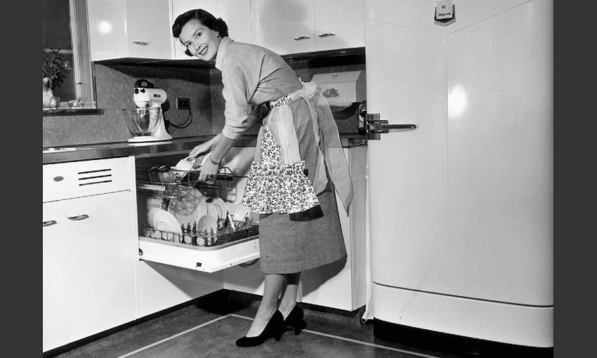 1950s housewife unloading dishwasher