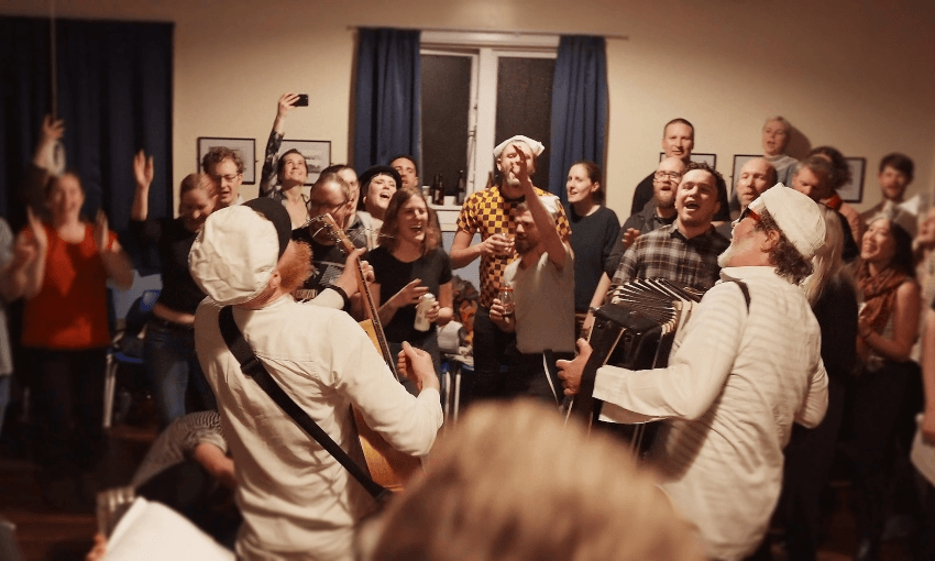 The Wellington Sea Shanty Society playing Breaker Bay hall in 2020 (Image via Facebook) 
