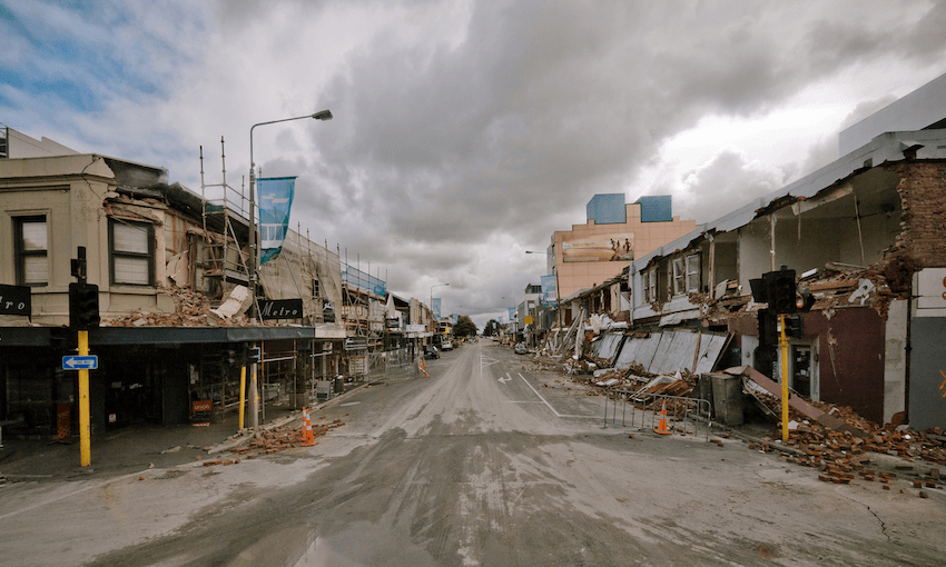 Rubble and damaged buildings lining a deserted Colombo St in the days following the February 22, 2011 quake (Photo: Logan McMillan/AFP via Getty Images)