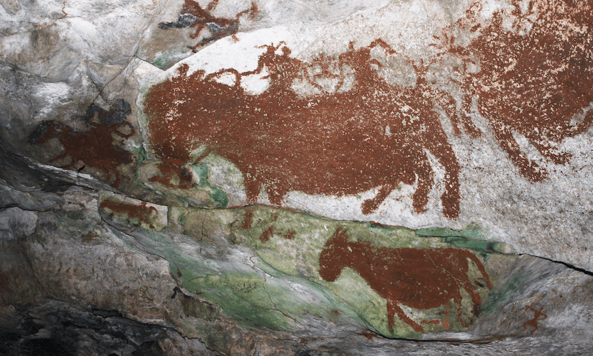An October 2011 photo of prehistoric rock paintings seen in a cave near Raha, Muna Island, Southeast Sulawesi province, Indonesia. The remote location can be reached by walking into the cave system after a short drive from Raha. The park and cave system is protected for cultural heritage.