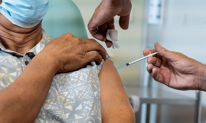 A woman is vaccinated against Covid-19 in Papeete, French Polynesia, on January 12, 2021. (Photo: SULIANE FAVENNEC/AFP via Getty Images) 
