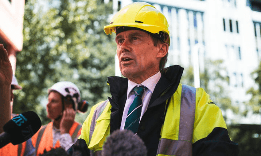 Wellington mayor Andy Foster wearing a hardhat, possibly to deflect missiles thrown by fellow councillors (Photo: Radio NZ, Samuel Rillstone)  
