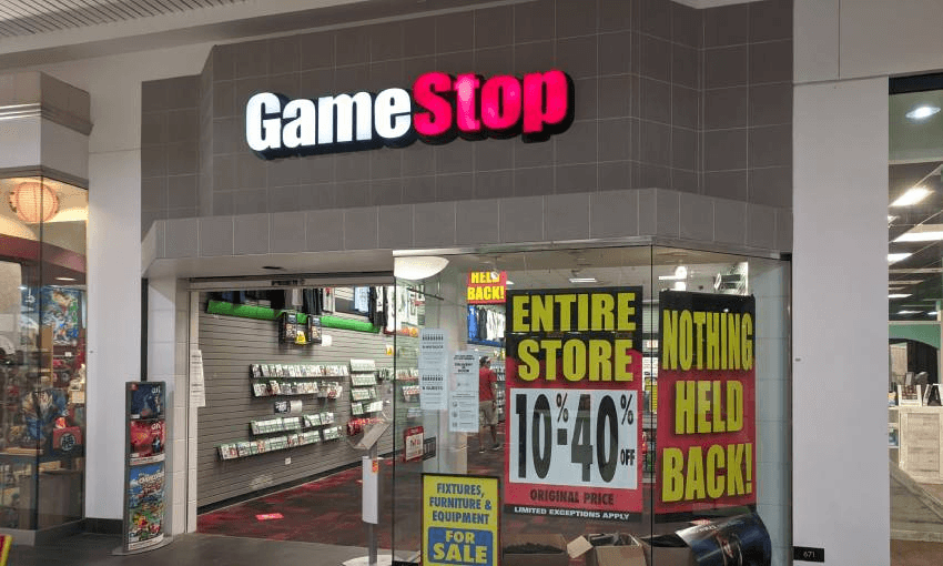 the outside of a gamestop store going into liquidation