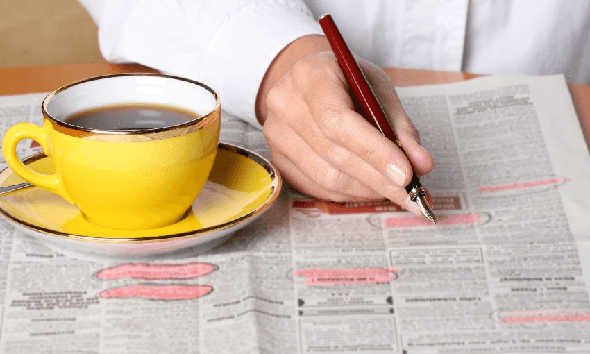 job listing with coffee cup getty