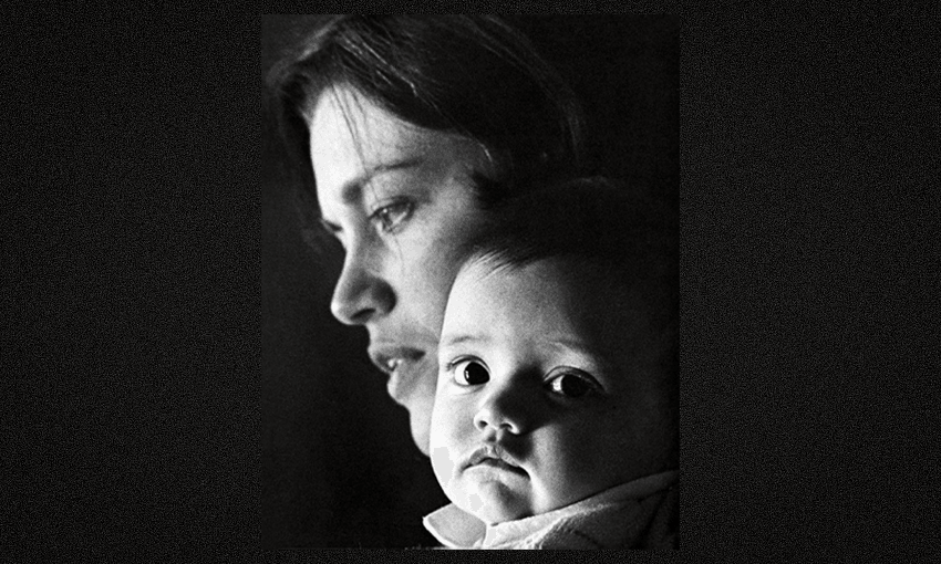 Black and white photograph of Charlotte Grimshaw as a baby with her mother, Kay.