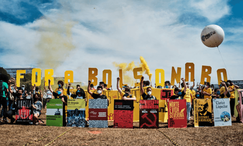 More than 100 protests against president of Jair Bolsonaro were held over the weekend, including this demonstration in Brasilia. (Photo by Gustavo Minas/Getty Images) 
